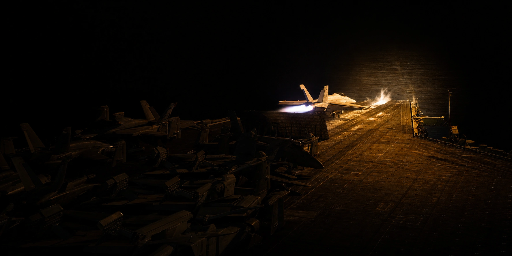 Carrier flight deck at night, one jet lit on the catapult, as AI search engines decide which sources to cite